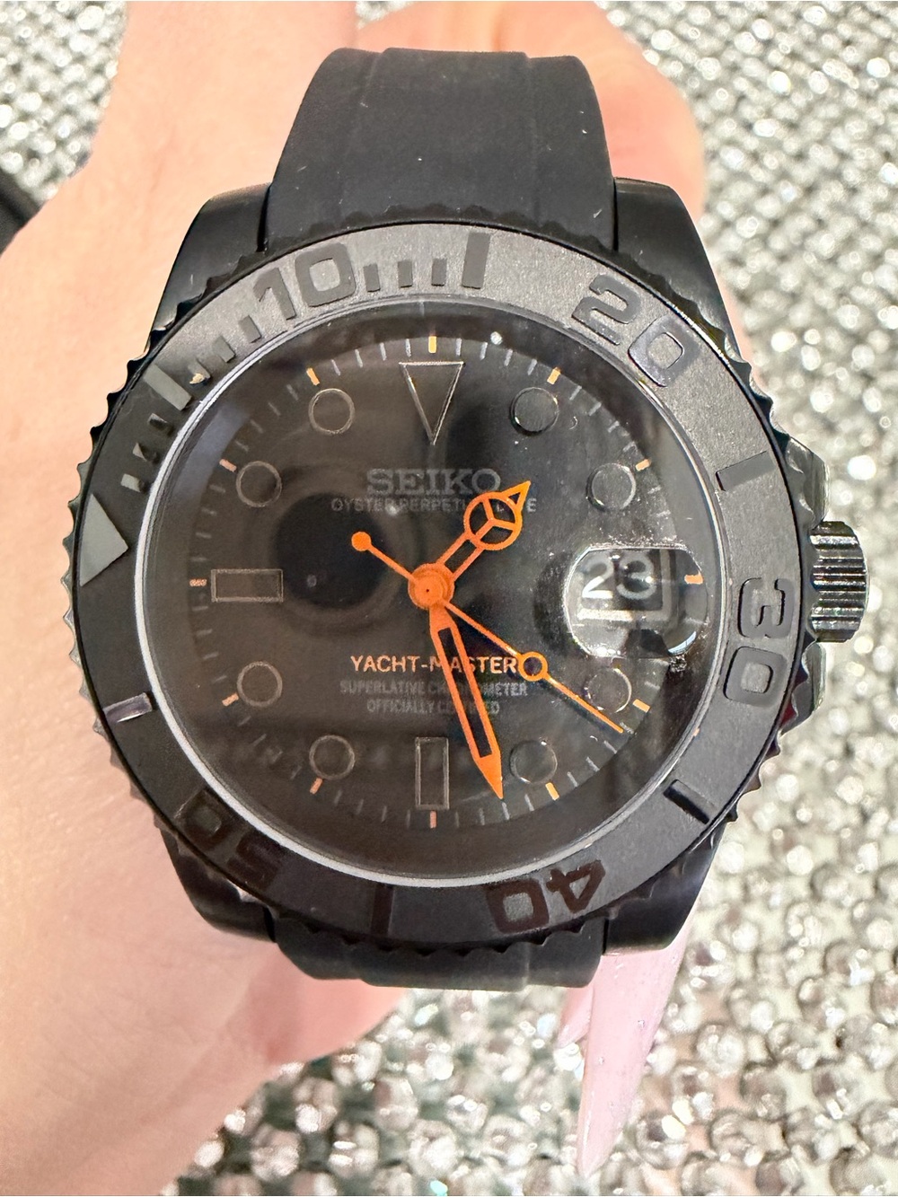 Seiko Men's Black Watch with Orange Hands and Markers